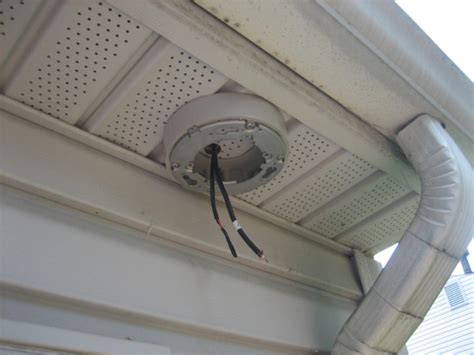 junction box for outside flood lights|installing flood lights vinyl soffit.